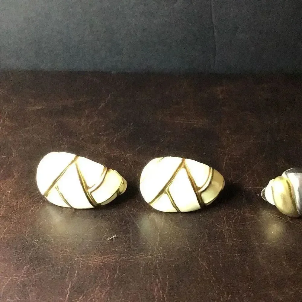 Earrings three pair of vintage clip on